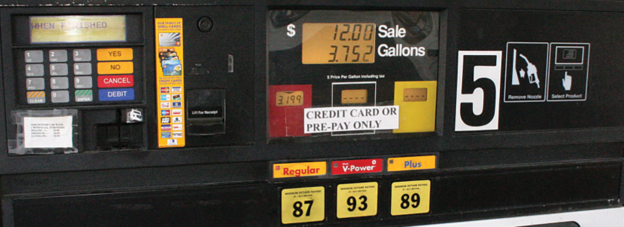 An image of a gas pump that reads “$12.00 Sale, 3.752 Gallons”.