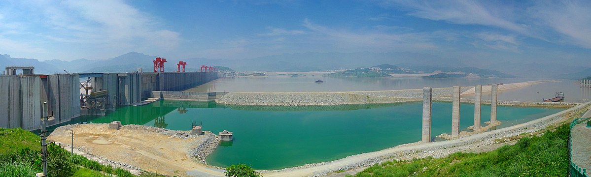 dams are the largest structures made by humans and dwarf even the largest ships.