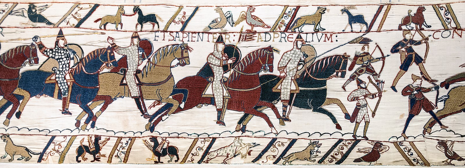 embroidered cloth depicting men on horses in battle scene