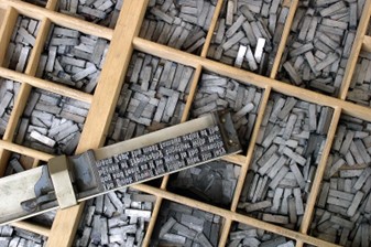 Movable typesetting for a printing press