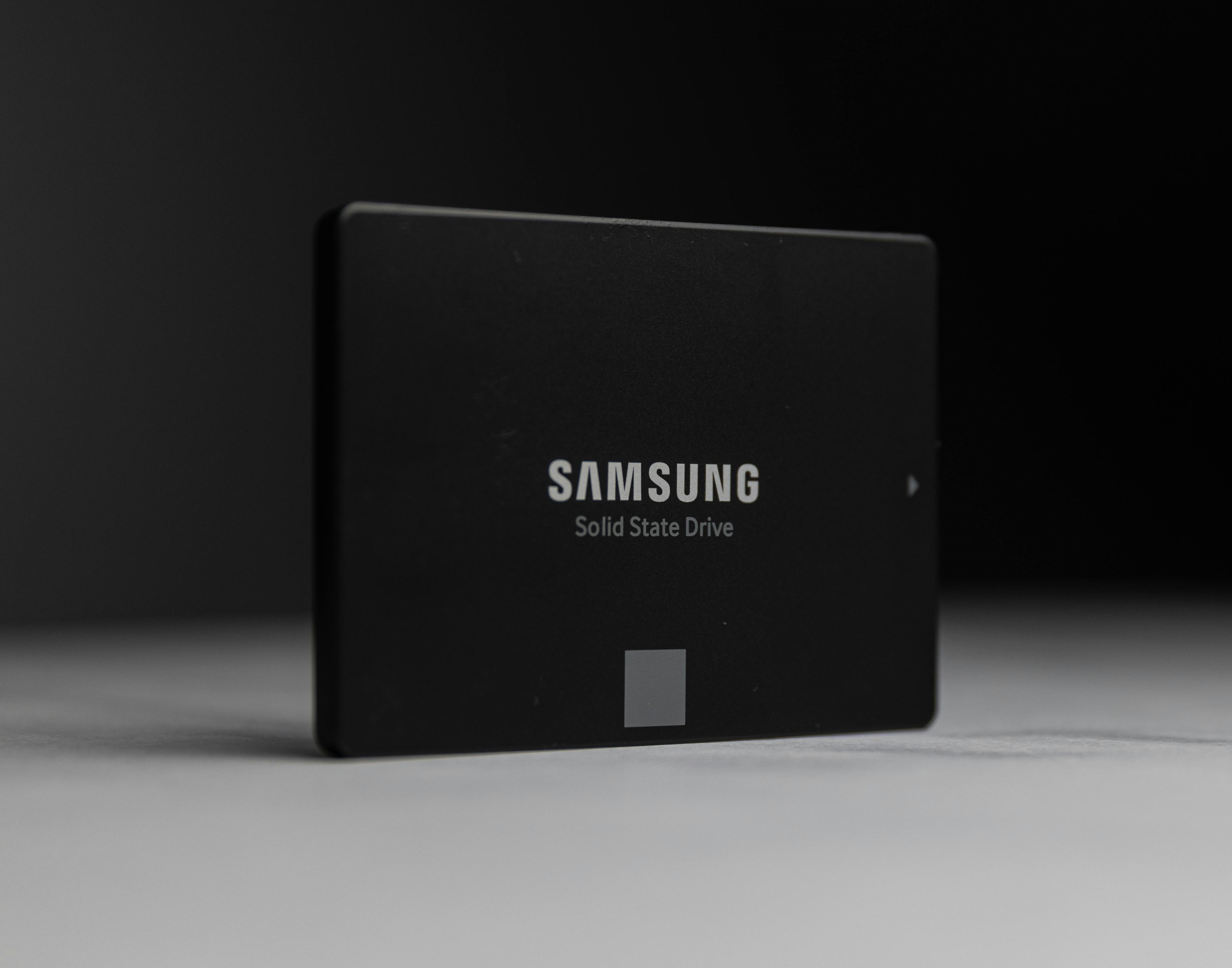A Samsung solid-state drive which is flat, rectangular, and black in color.